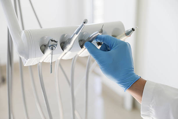 Professional Tooth Extraction technician working in Douglass, KS
